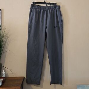 NIKE GRAY WINDBREAKER DRI-FIT PANTS, SIZE LARGE